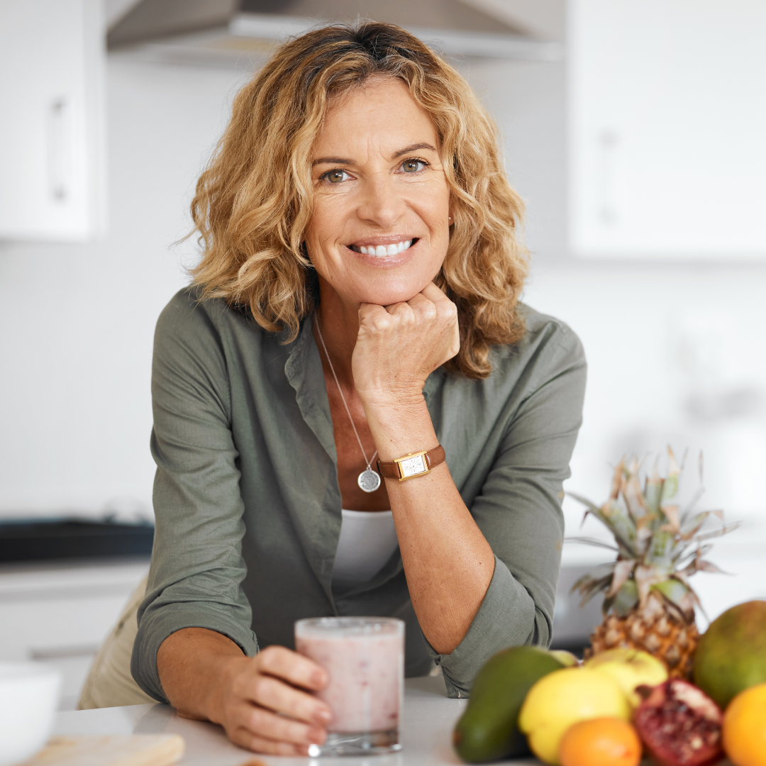 lady in kitchen smiling.png__PID:fe37e1e8-65d6-4059-8b2d-e0fe423a5a04
